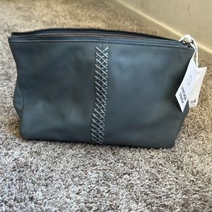 The Sak grey wristlet